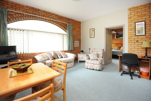 Imagen de la habitación del Hotel The Tahitian Holiday Apartments. Foto 1