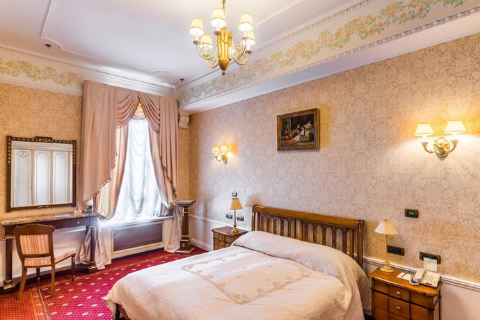 Imagen de la habitación del Hotel The Taleon Imperial. Foto 10