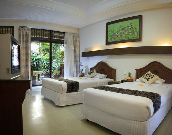 Imagen de la habitación del Hotel The Taman Ayu. Foto 2