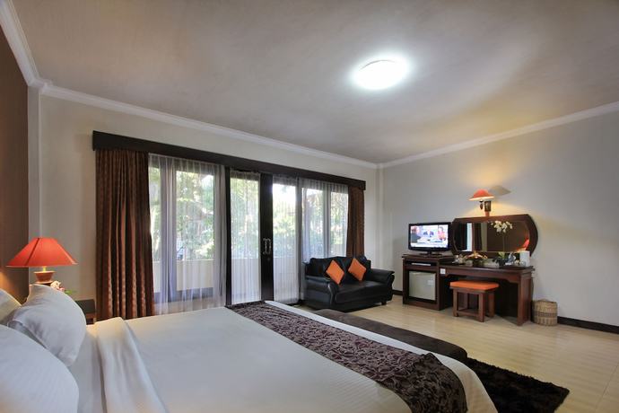 Imagen de la habitación del Hotel The Taman Ayu. Foto 3