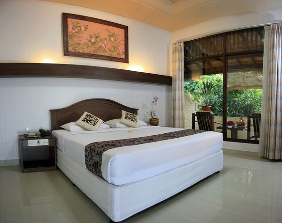 Imagen de la habitación del Hotel The Taman Ayu. Foto 5