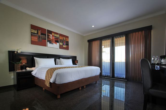 Imagen de la habitación del Hotel The Taman Ayu. Foto 6