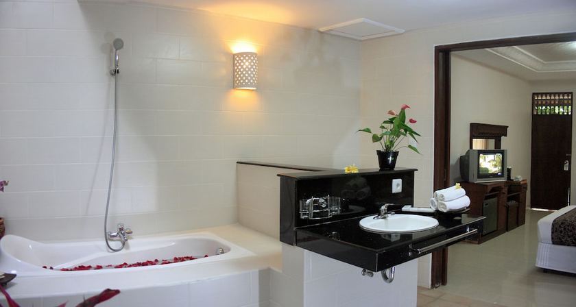 Imagen de la habitación del Hotel The Taman Ayu. Foto 9