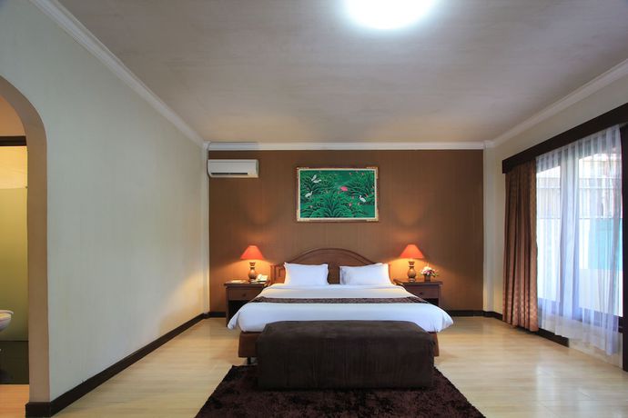 Imagen de la habitación del Hotel The Taman Ayu. Foto 11