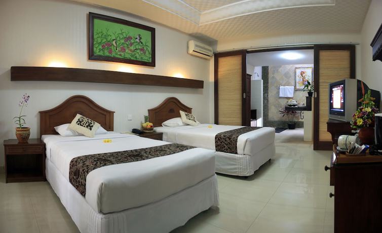 Imagen de la habitación del Hotel The Taman Ayu. Foto 12