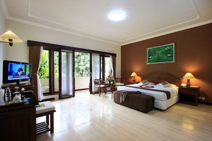 Imagen de la habitación del Hotel The Taman Ayu. Foto 13