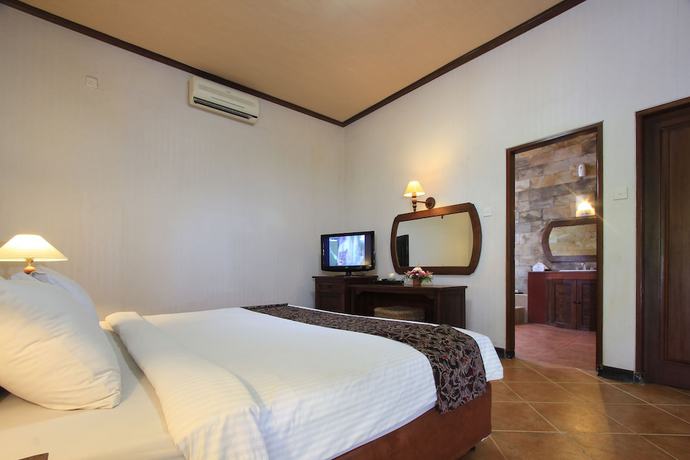Imagen de la habitación del Hotel The Taman Ayu. Foto 16