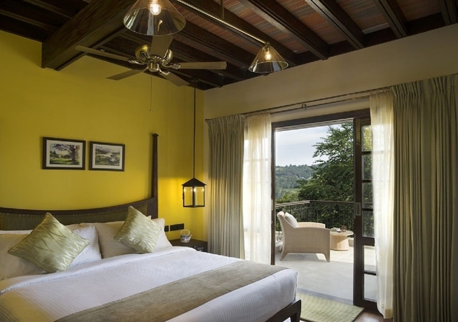 Imagen de la habitación del Hotel The Tamara Kodai. Foto 11