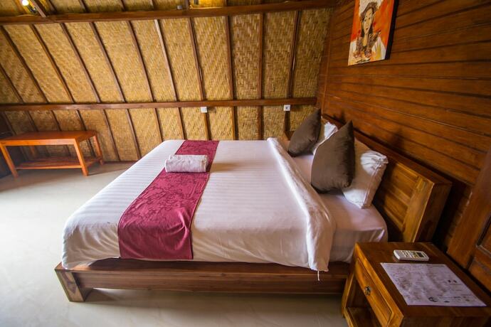 Imagen de la habitación del Hotel The Tandjung Cottage. Foto 21