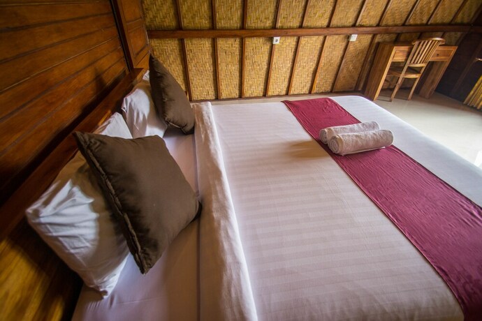 Imagen de la habitación del Hotel The Tandjung Cottage. Foto 22