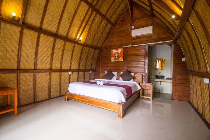 Imagen de la habitación del Hotel The Tandjung Cottage. Foto 24