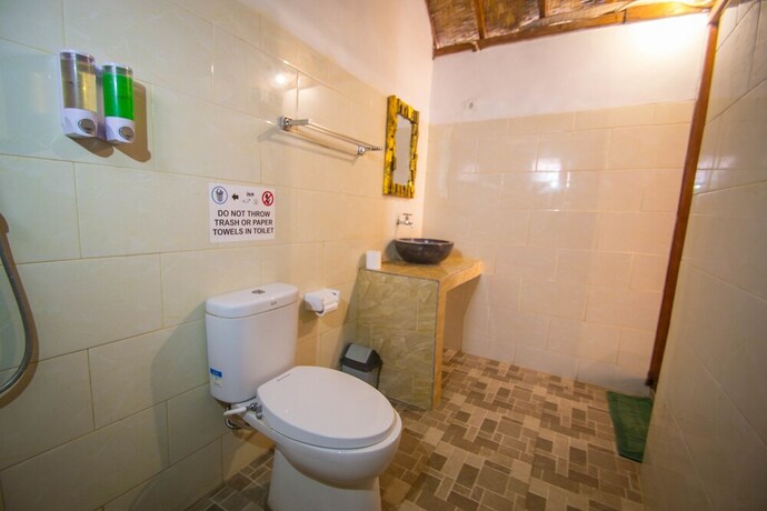 Imagen de la habitación del Hotel The Tandjung Cottage. Foto 26