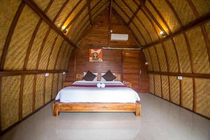 Imagen de la habitación del Hotel The Tandjung Cottage. Foto 27