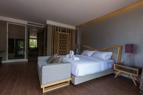 Imagen de la habitación del Hotel The Tarna Resort, Koh Tao. Foto 7