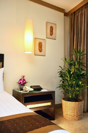 Imagen de la habitación del Hotel The Tarntawan Surawong Bangkok. Foto 6