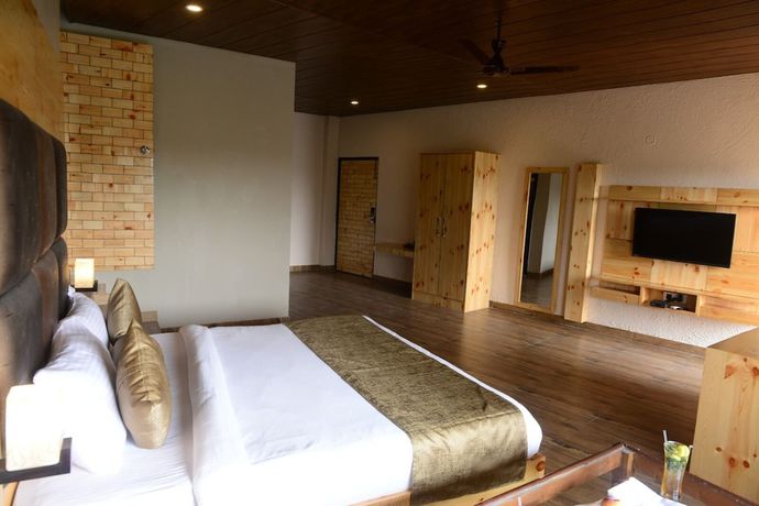 Imagen de la habitación del Hotel The Tattwaa Corbett Spa and Resort. Foto 4