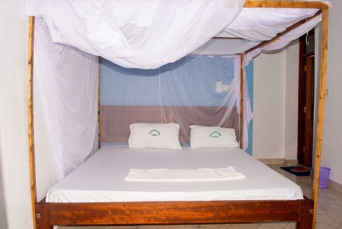 Imagen de la habitación del Hotel The Tavern Inn Shanzu. Foto 8
