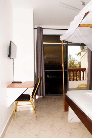 Imagen de la habitación del Hotel The Tavern Inn Shanzu. Foto 12