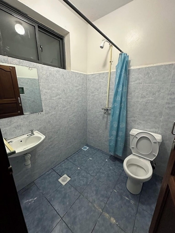 Imagen de la habitación del Hotel The Tavern Inn Shanzu. Foto 15