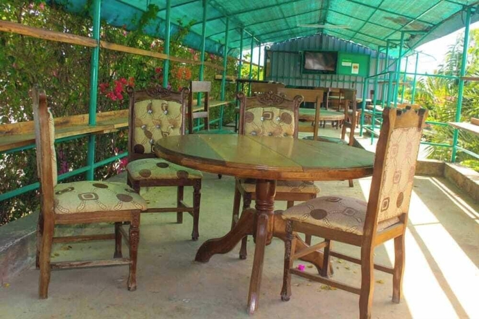 Imagen del bar/restaurante del Hotel The Tavern Inn Shanzu. Foto 3