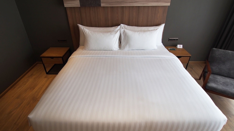 Imagen de la habitación del Hotel The Teak. Foto 2