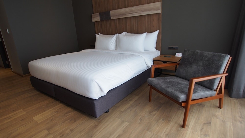 Imagen de la habitación del Hotel The Teak. Foto 6