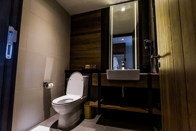 Imagen de la habitación del Hotel The Teak. Foto 9