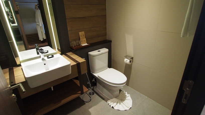 Imagen de la habitación del Hotel The Teak. Foto 10