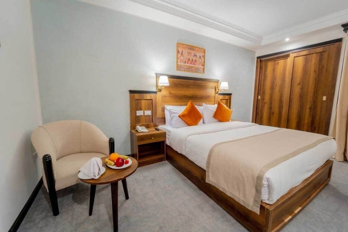 Imagen de la habitación del Hotel The Temple Luxor. Foto 12