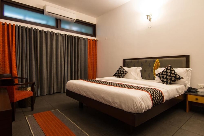 Imagen de la habitación del Hotel The Ten Suites. Foto 3