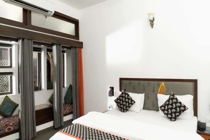 Imagen de la habitación del Hotel The Ten Suites. Foto 4