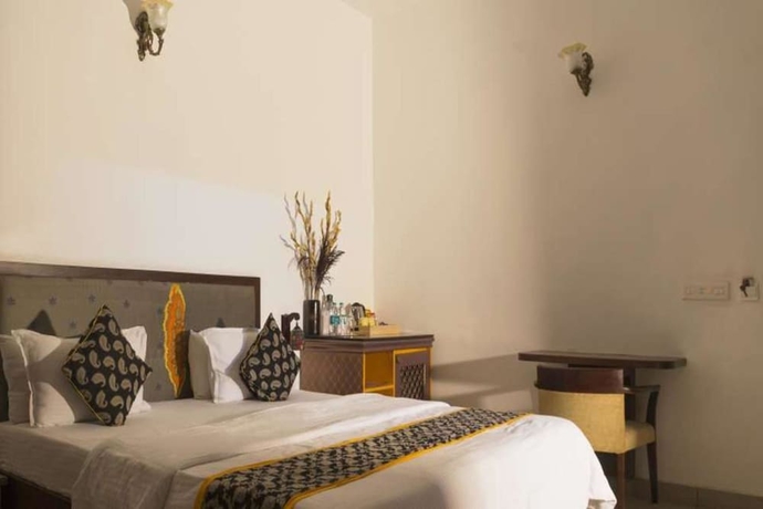 Imagen de la habitación del Hotel The Ten Suites. Foto 7