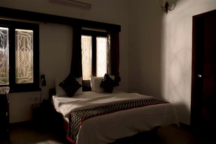 Imagen de la habitación del Hotel The Ten Suites. Foto 9