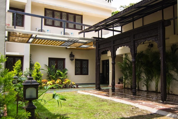 Imagen de la habitación del Hotel The Ten Suites. Foto 11