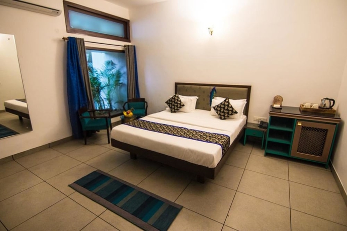 Imagen de la habitación del Hotel The Ten Suites. Foto 14