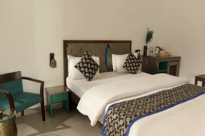 Imagen de la habitación del Hotel The Ten Suites. Foto 15