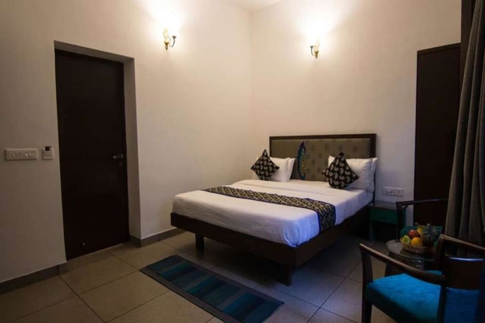 Imagen de la habitación del Hotel The Ten Suites. Foto 16