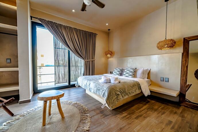 Imagen de la habitación del Hotel The Teodoro. Foto 12