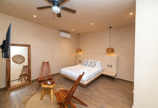 Imagen de la habitación del Hotel The Teodoro. Foto 13