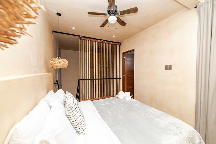 Imagen de la habitación del Hotel The Teodoro. Foto 16