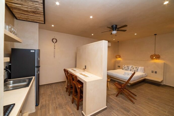 Imagen de la habitación del Hotel The Teodoro. Foto 18