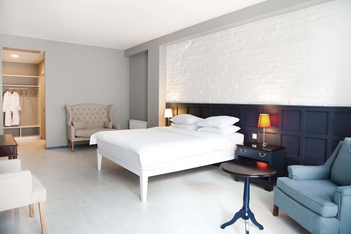 Imagen de la habitación del Hotel The Terrace Boutique. Foto 5