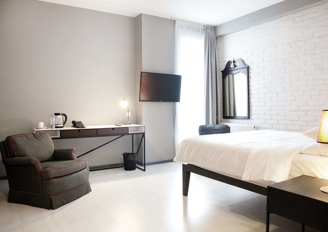 Imagen de la habitación del Hotel The Terrace Boutique. Foto 6