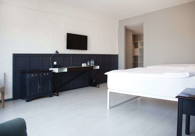 Imagen de la habitación del Hotel The Terrace Boutique. Foto 15