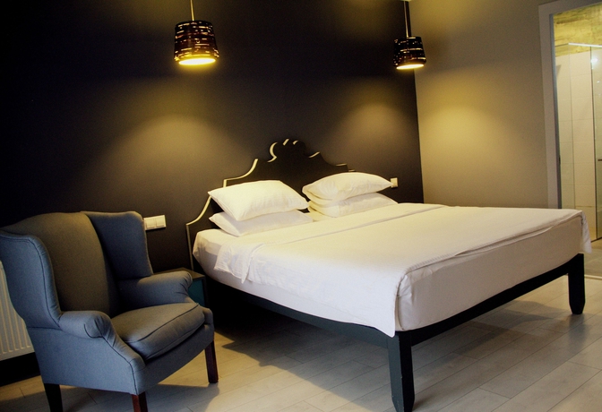 Imagen de la habitación del Hotel The Terrace Boutique. Foto 16