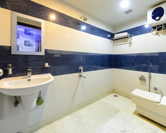 Imagen de la habitación del Hotel The Tezo Residency. Foto 12