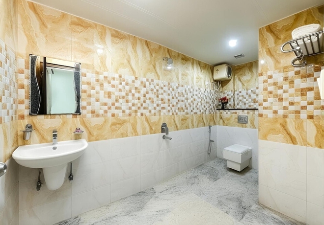 Imagen de la habitación del Hotel The Tezo Residency. Foto 14