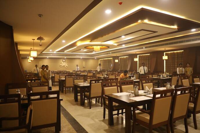 Imagen del bar/restaurante del Hotel The Thangam Grand. Foto 12