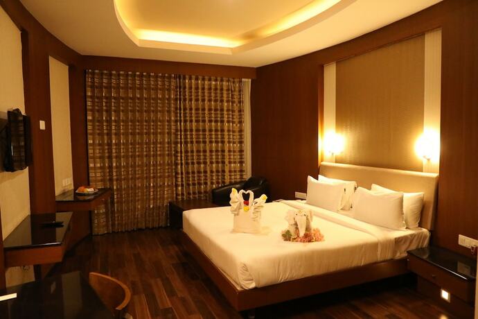 Imagen de la habitación del Hotel The Thangam Grand. Foto 14
