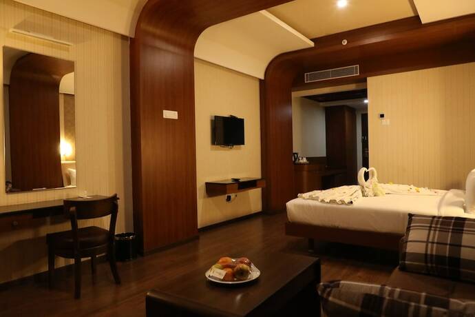Imagen de la habitación del Hotel The Thangam Grand. Foto 15